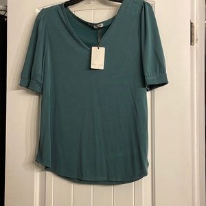 Green Envelope jade green top. New with tags